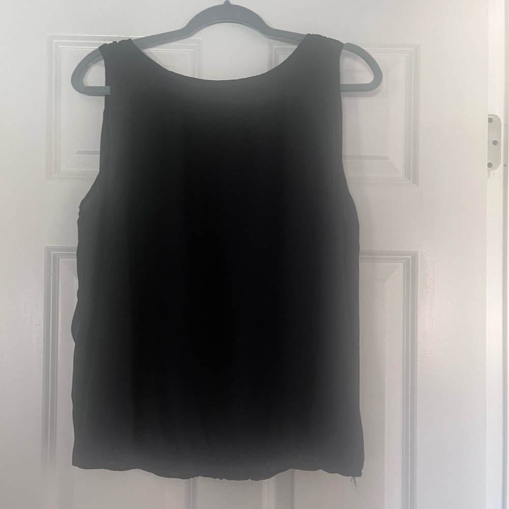 Max studio sleeveless top with tie back and cinched bottom. Size large